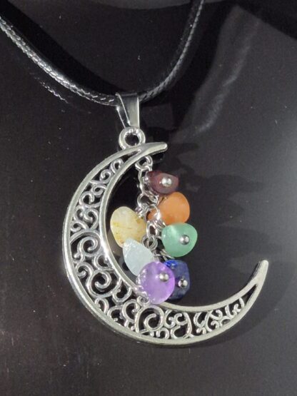 Natural Chakra Stones Dangle on a Crescent Moon Pendant