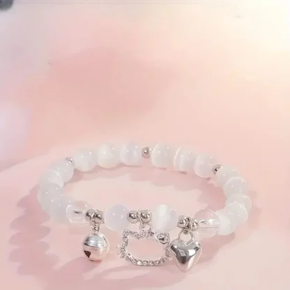 White Glass Beads Bracelet with "Cartoon Kitty" and other charms