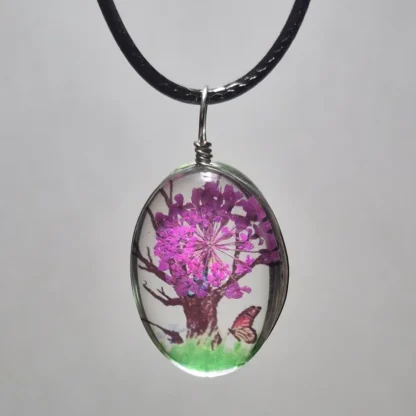 Fuchsia Dried Flower Oval Shaped Resin Pendant