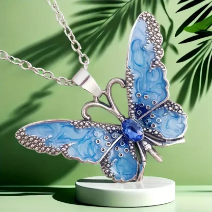 Pastel Blue Enamel Butterfly Pendant With Rhinestone Body