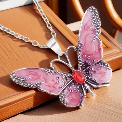 Pastel Pink Enamel Butterfly Pendant With Rhinestone Body