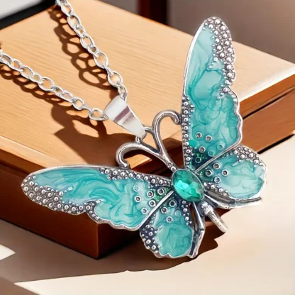 Pastel Teal Enamel Butterfly Pendant With Rhinestone Body