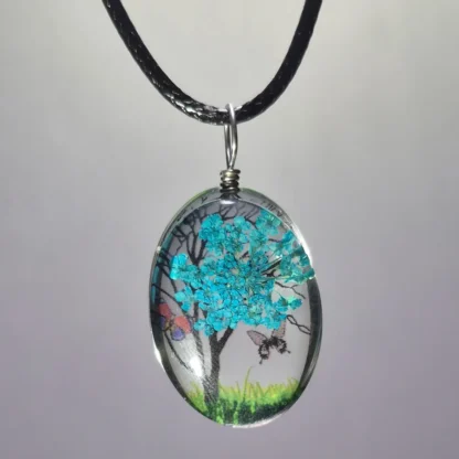 Teal Blue Dried Flower Oval Shaped Resin Pendant