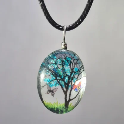 Teal Blue Dried Flower Oval Shaped Resin Pendant - Image 2